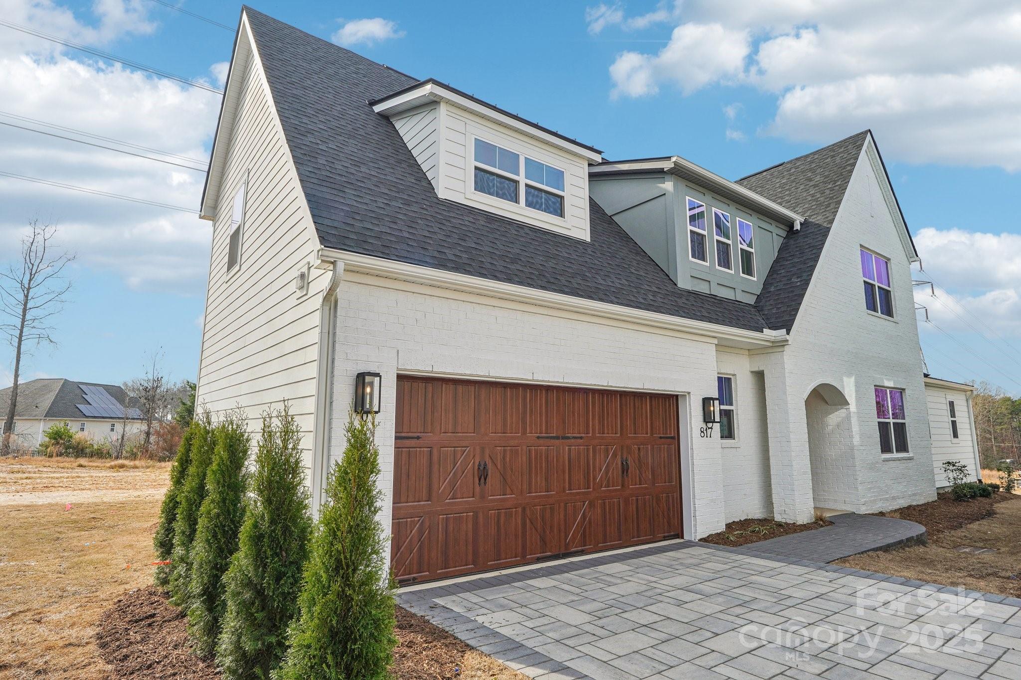 817 Terra Drive Tega Cay, SC 29708 - Photo 2 of 38 a front view of a house