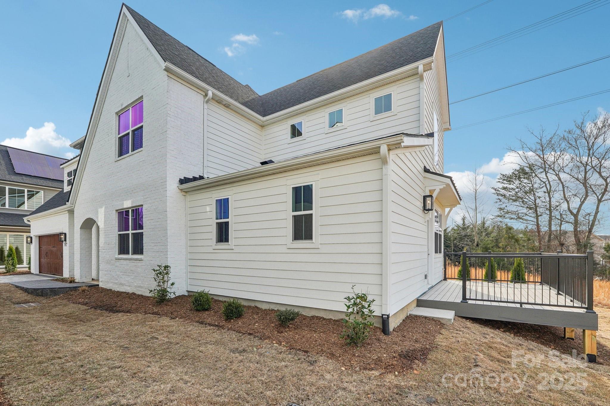 817 Terra Drive Tega Cay, SC 29708 - Photo 27 of 38 a view of a house with a yard