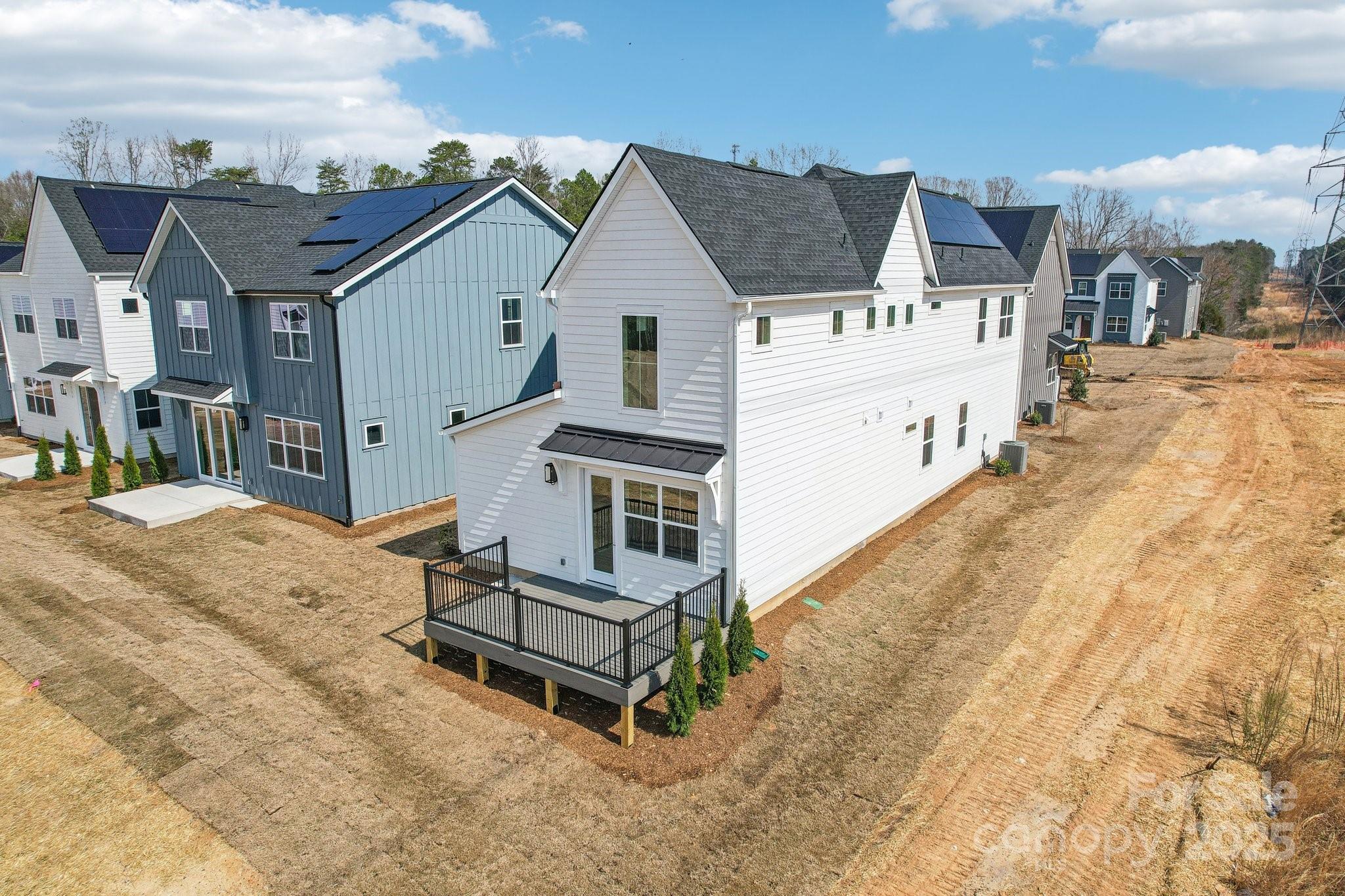 817 Terra Drive Tega Cay, SC 29708 - Photo 30 of 38 a front view of a house with a yard