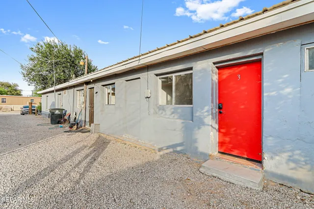 a backyard of a house with seating space