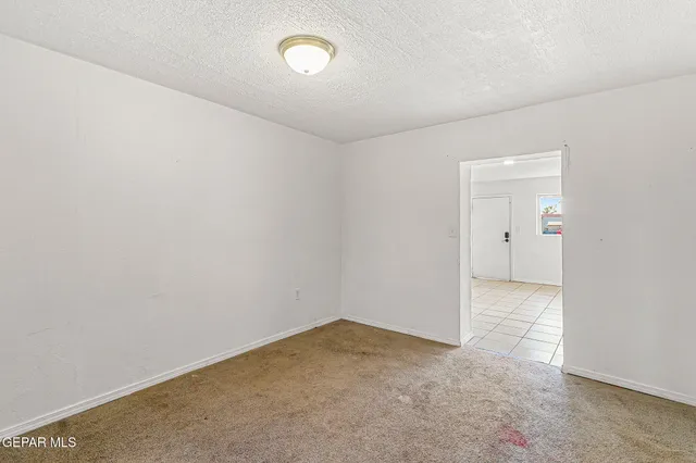 an empty room with an entryway