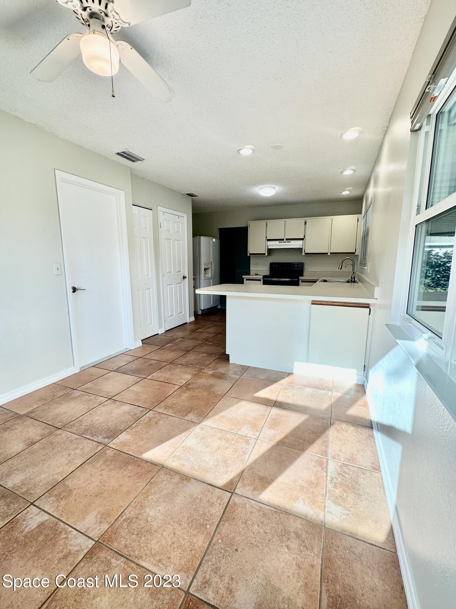 1247 Valleybrook Road Southeast Palm Bay, FL 32909 - Photo 4 of 23 IMG_E2888