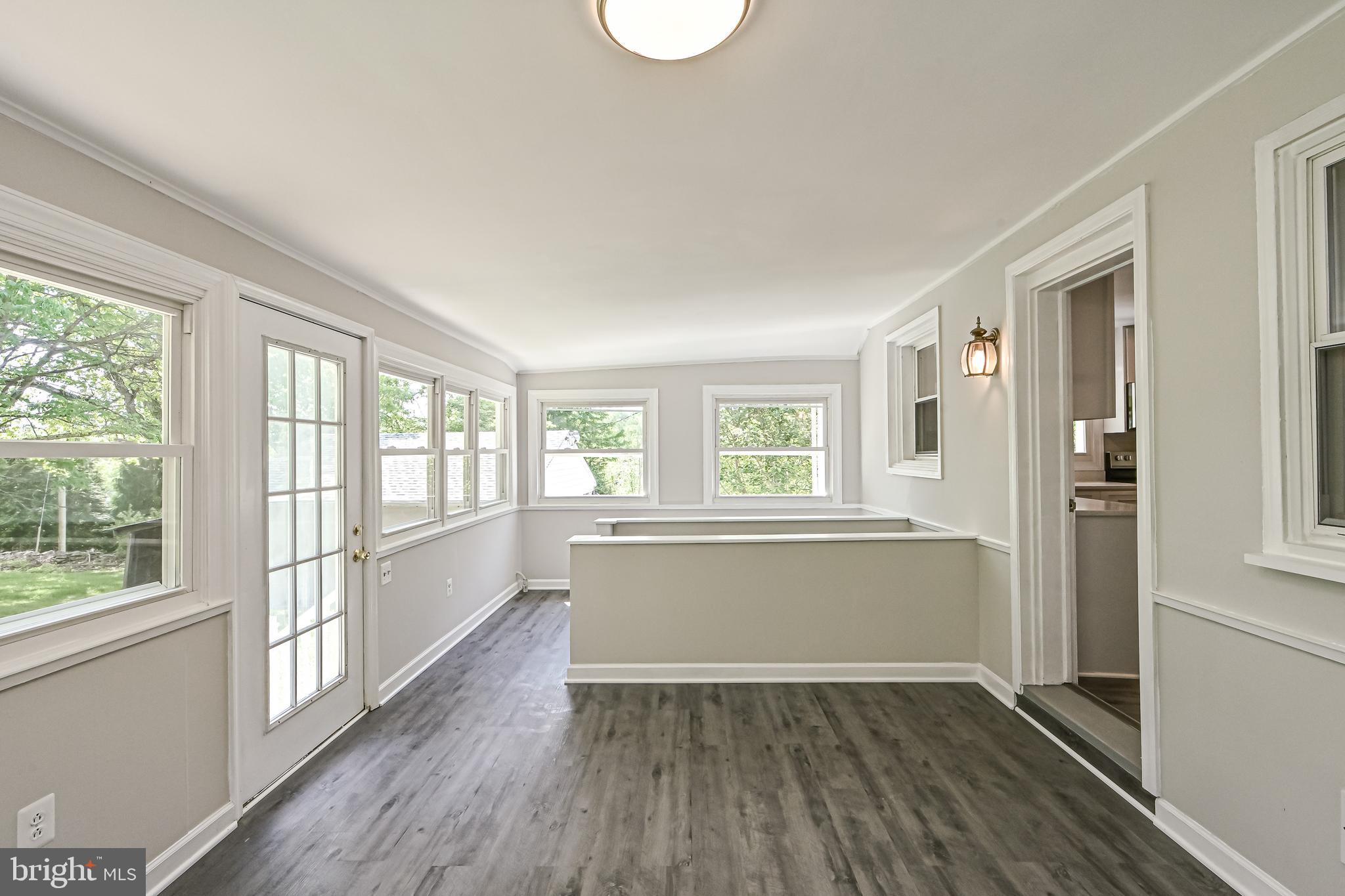 7833 Gambrill Park Road Frederick, MD 21702 - Photo 26 of 34 sunroom stairs to basement