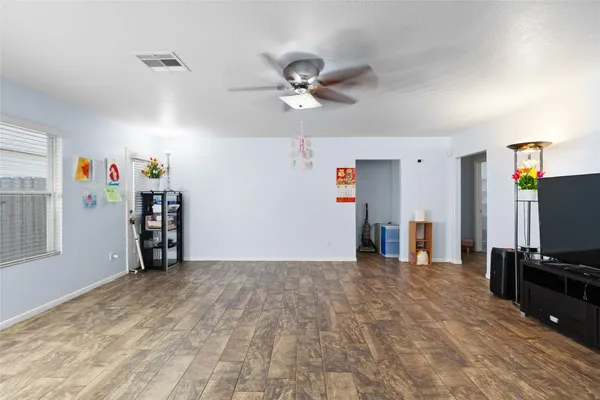a view of a storage & utility room with a window