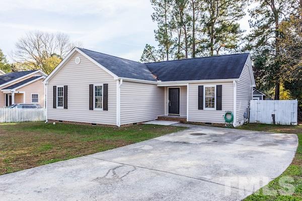 1925 Carthage Circle Raleigh, NC 27604 - Photo 1 of 15 a view of a house with a yard