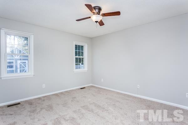 1925 Carthage Circle Raleigh, NC 27604 - Photo 7 of 15 wooden floor in an empty room with a window