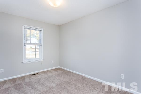 1925 Carthage Circle Raleigh, NC 27604 - Photo 10 of 15 an empty room with a window
