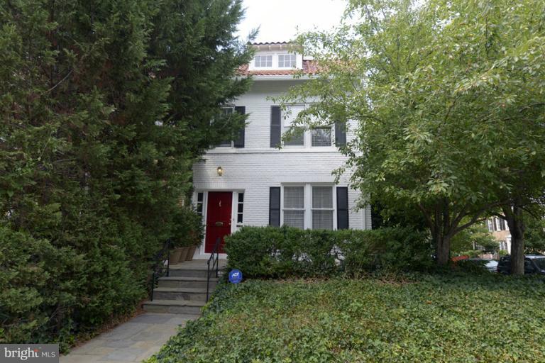 3401 R Street Northwest Washington, DC 20007 - Photo 1 of 1 a front view of a house with garden