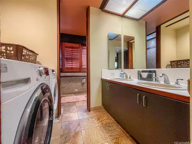 a bathroom with a toilet and a bathtub