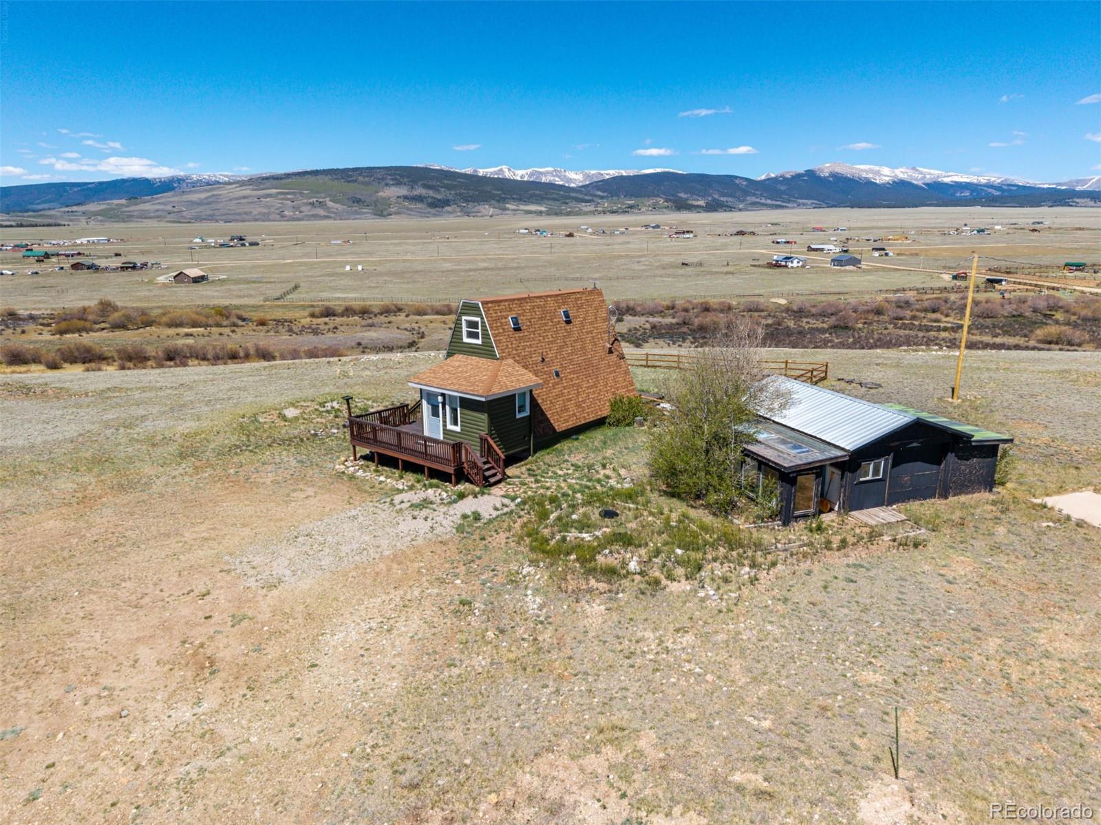 1365 Kokanee Road Fairplay, CO 80440 - Photo 34 of 45 a view of a big yard with an ocean view