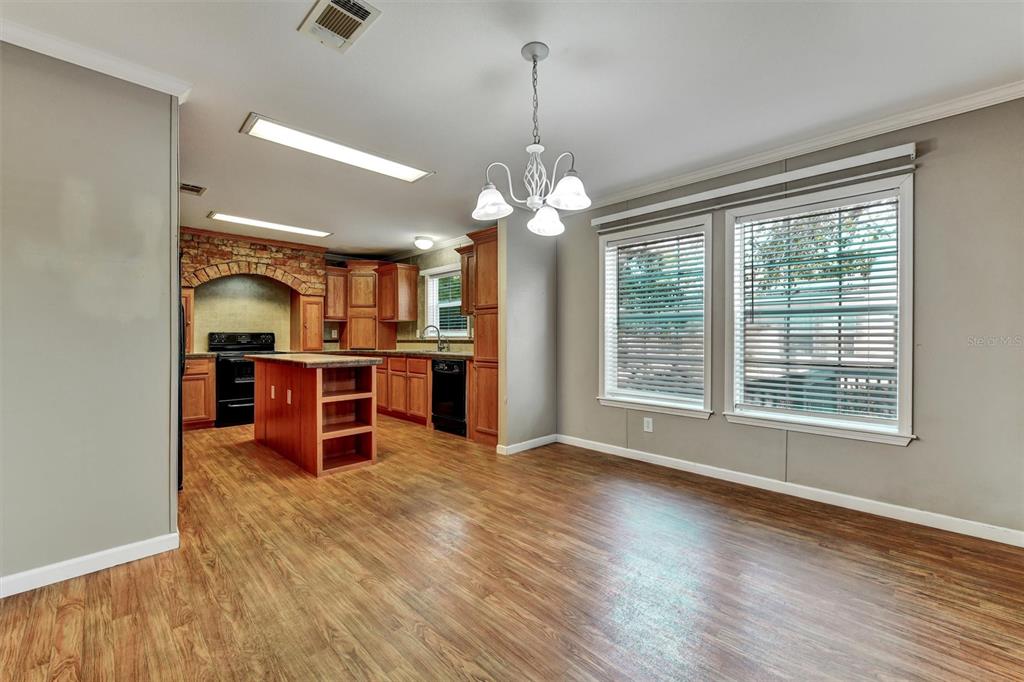 312 Aristides Street Dunedin, FL 34698 - Photo 15 of 38 a view of a room with kitchen and window