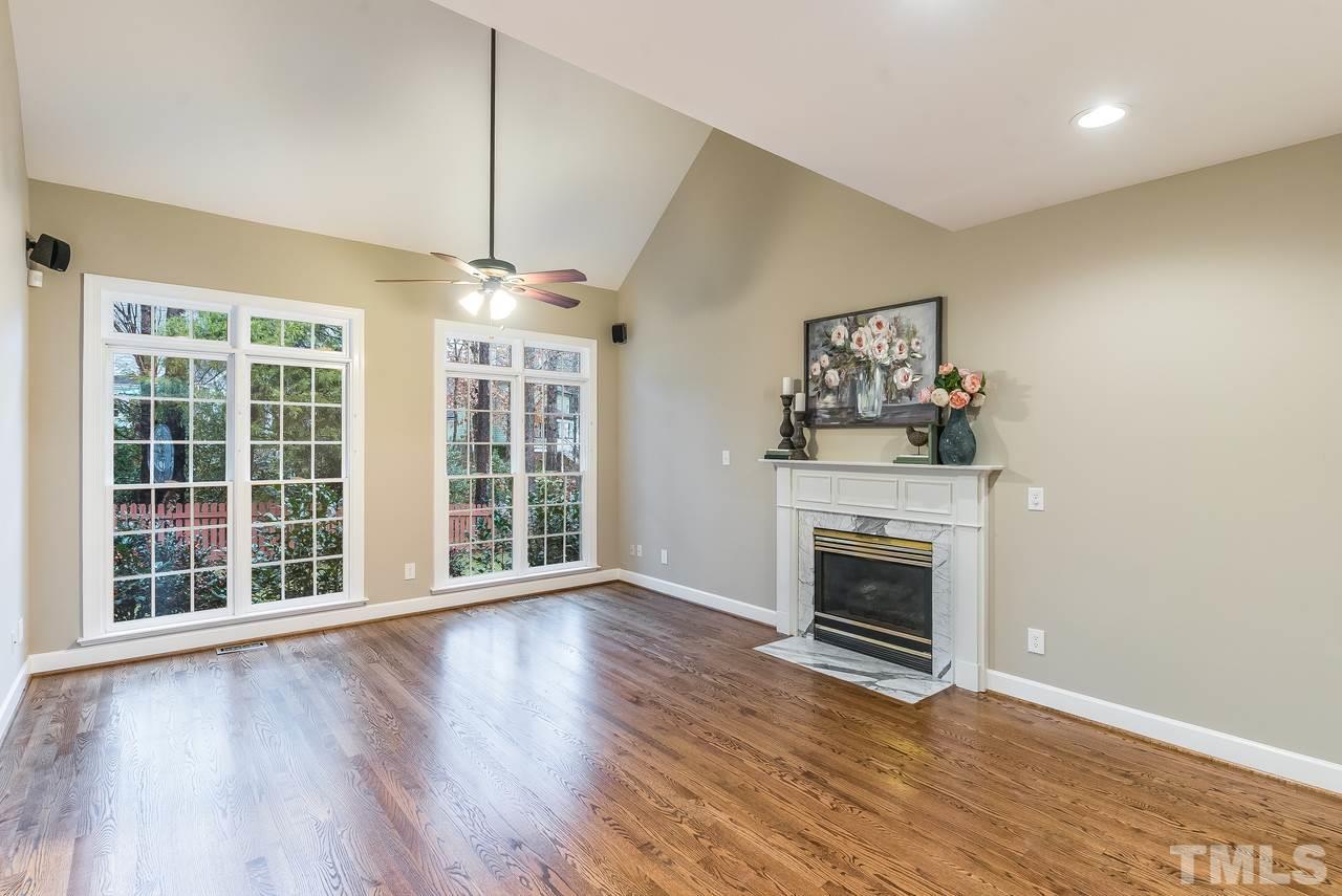 3712 Evander Way Raleigh, NC 27613 - Photo 4 of 13 New HARDWOODS in the family room with vaulted ceilings really make this room so bright and spacious. There is a nice gas fireplace too for those chilly nights.