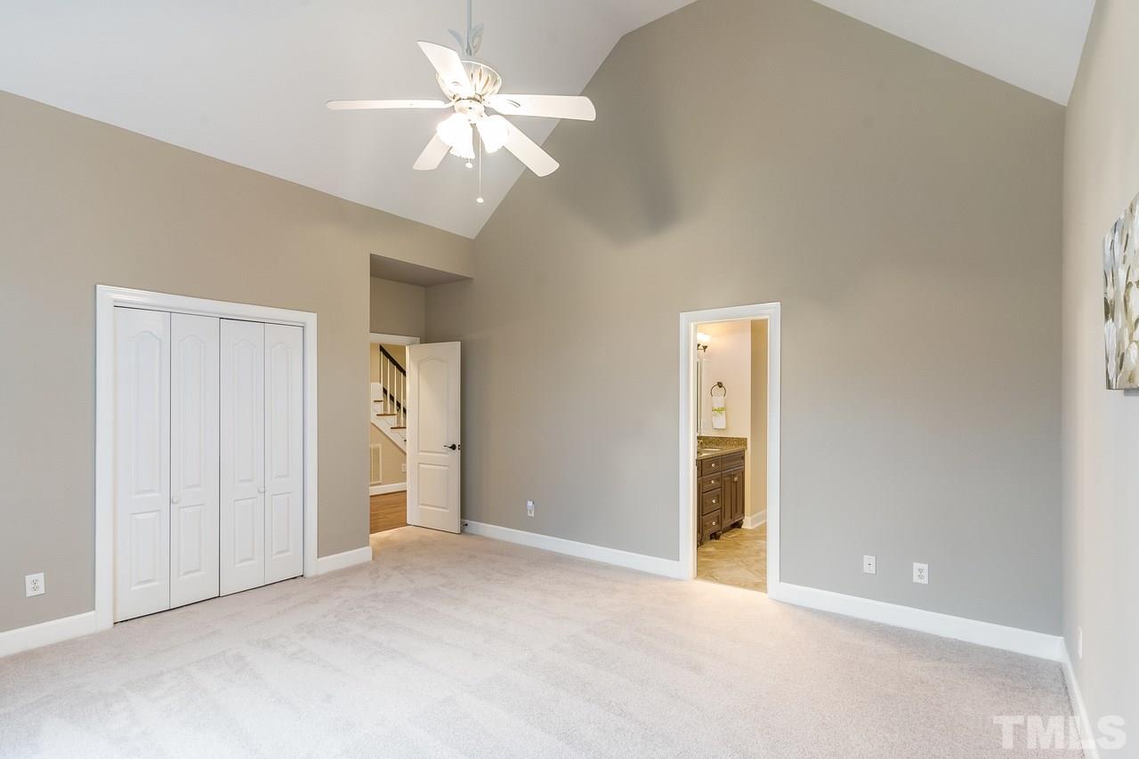 3712 Evander Way Raleigh, NC 27613 - Photo 5 of 13 FIRST FLOOR owners suite has vaulted ceilings, NEW CARPET and lots of privacy.