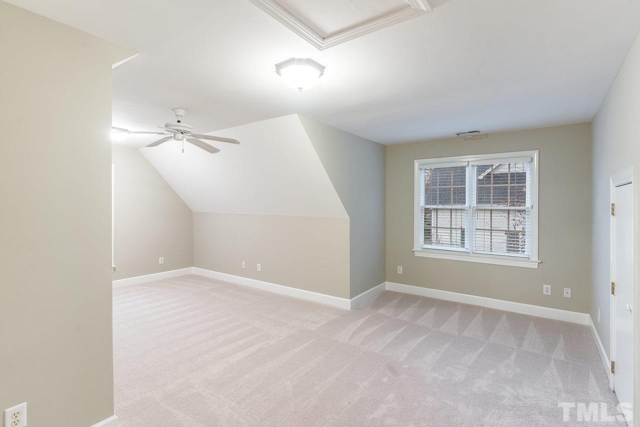 3712 Evander Way Raleigh, NC 27613 - Photo 8 of 13 The 4th bedroom is huge! It could be a BONUS room, THEATER room - HOME GYM - you choose!