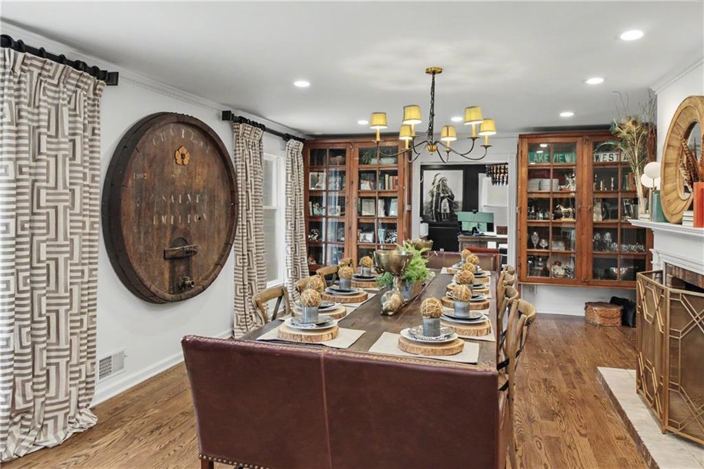 112 Maple Drive Cartersville, GA 30120 - Photo 20 of 105 a view of a dining room with furniture and chandelier
