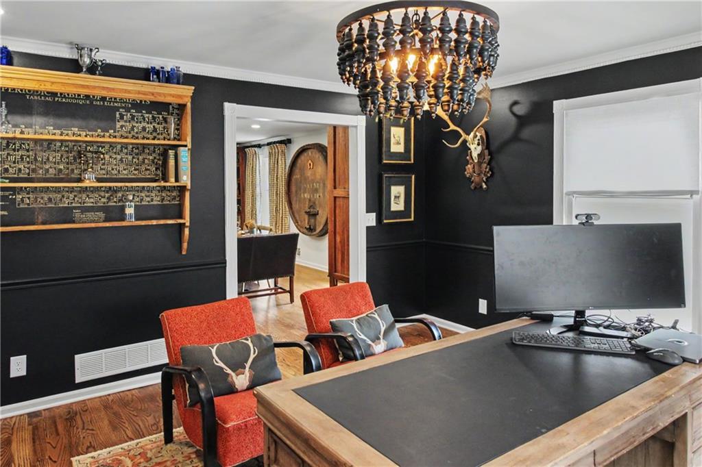 112 Maple Drive Cartersville, GA 30120 - Photo 41 of 105 a view of a dining room with furniture and chandelier