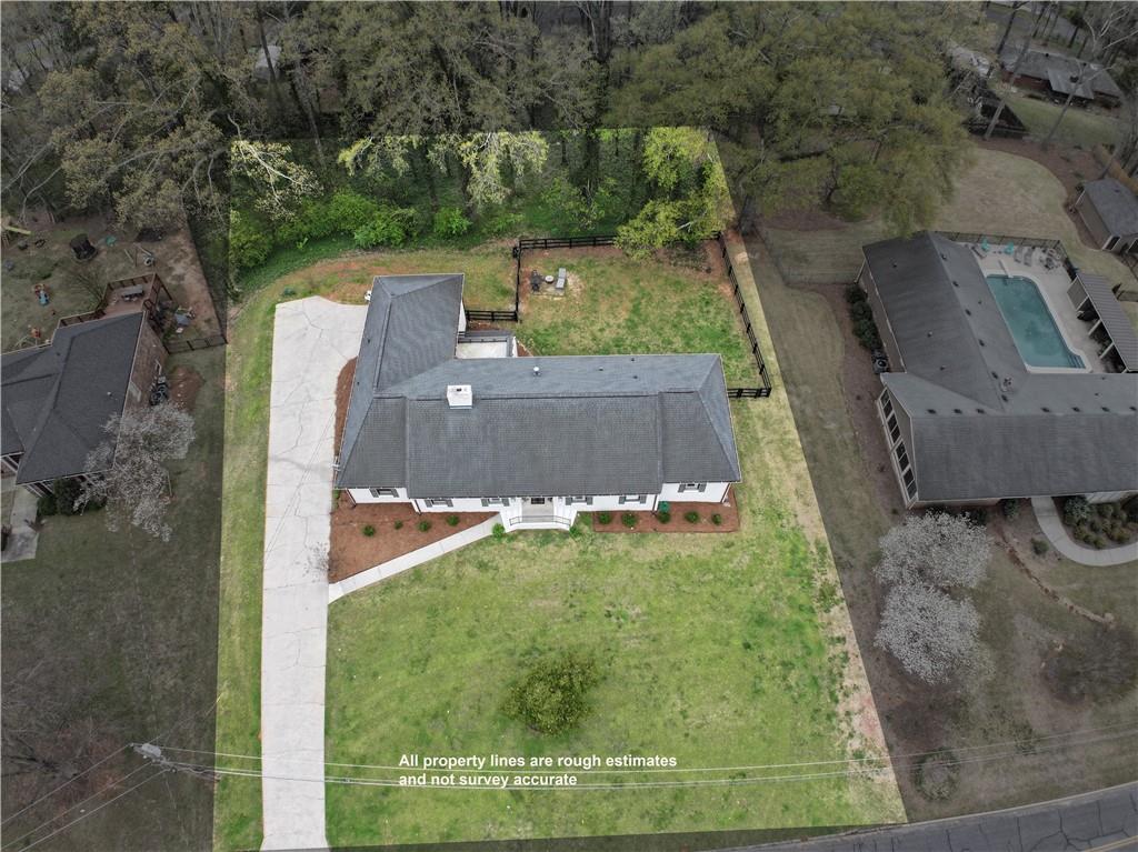 112 Maple Drive Cartersville, GA 30120 - Photo 7 of 105 a view of a yard with a small pool