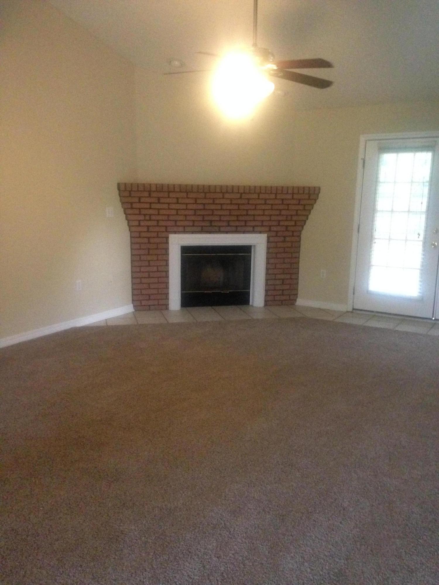 5973 Old Bethel Road Crestview, FL 32536 - Photo 4 of 18 a view of empty room with a fireplace