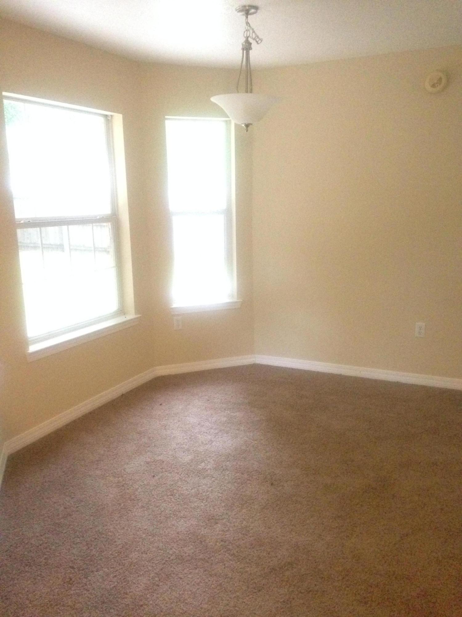 5973 Old Bethel Road Crestview, FL 32536 - Photo 6 of 18 an empty room with a window