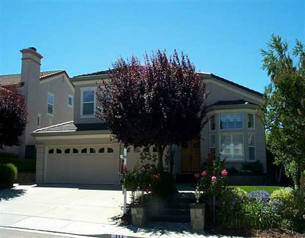 313 Flax Lane San Ramon, CA 94582 - Photo 1 of 1 a front view of a house with a garden