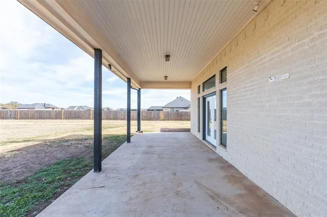 a house that has a large pool in front of it