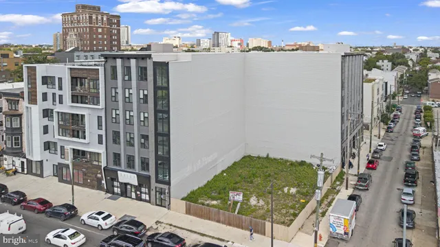 a view of a city with tall buildings