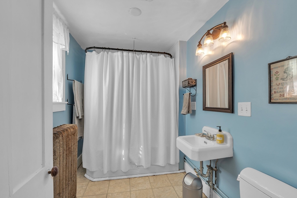 665 Thresher Road Hardwick, MA 01037 - Photo 29 of 41 a bathroom with a sink a toilet and shower