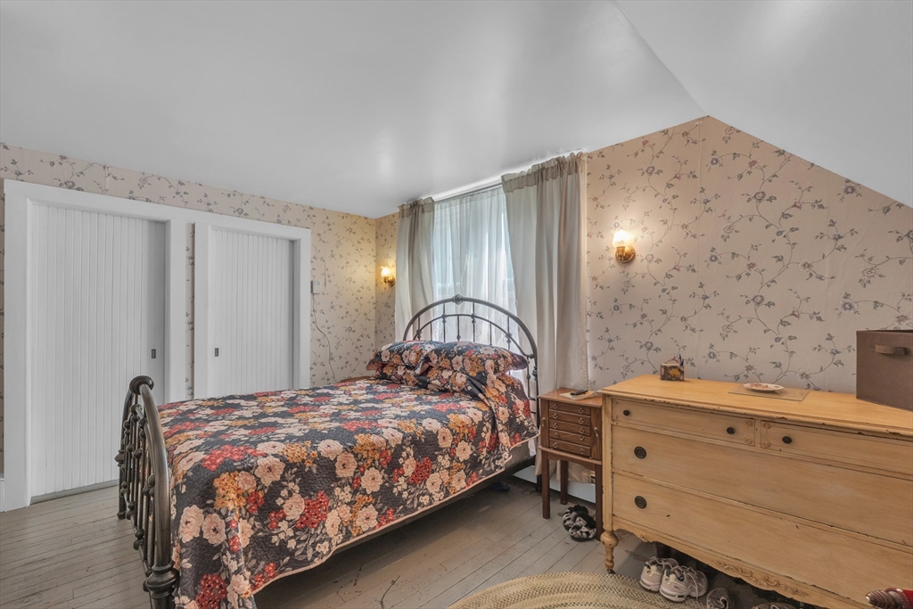 665 Thresher Road Hardwick, MA 01037 - Photo 31 of 41 a bedroom with a bed and a dresser