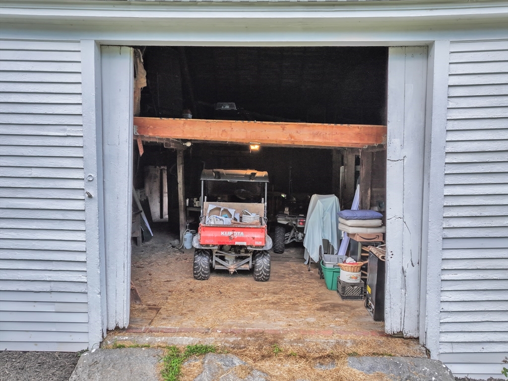 665 Thresher Road Hardwick, MA 01037 - Photo 35 of 41 a patio with table and chairs