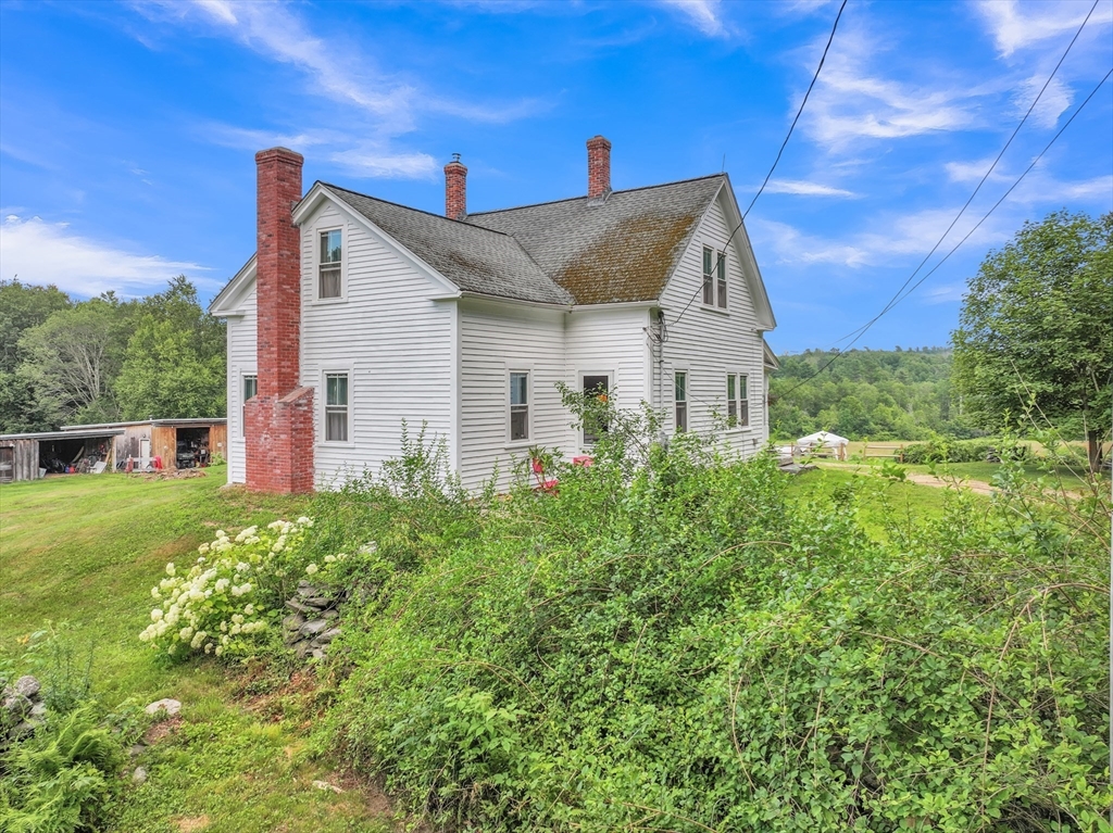 665 Thresher Road Hardwick, MA 01037 - Photo 8 of 41 a view of a house with a yard