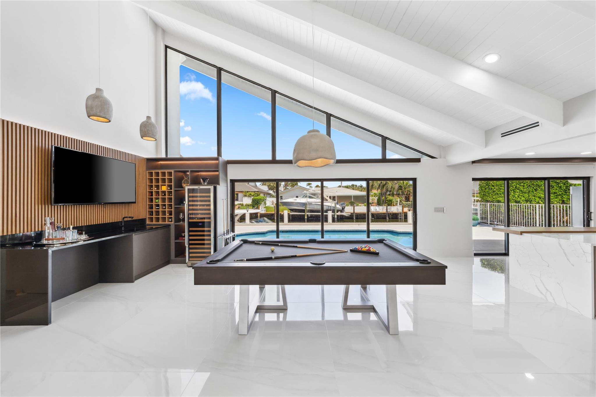 2901 Northeast 46th Street Lighthouse Point, FL 33064 - Photo 17 of 79 a living room with furniture and a flat screen tv