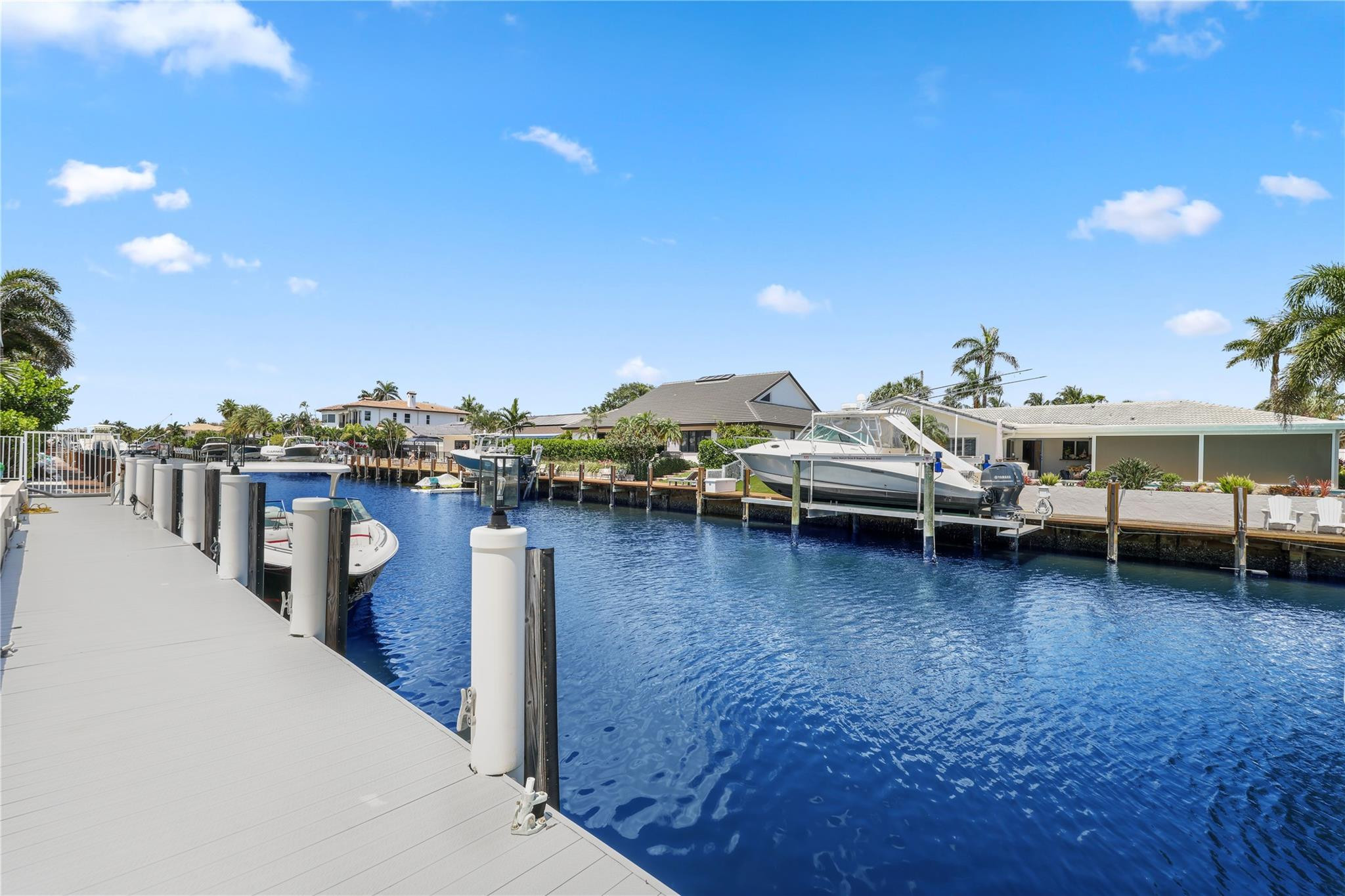 2901 Northeast 46th Street Lighthouse Point, FL 33064 - Photo 2 of 79 a view of a lake with boats and trees