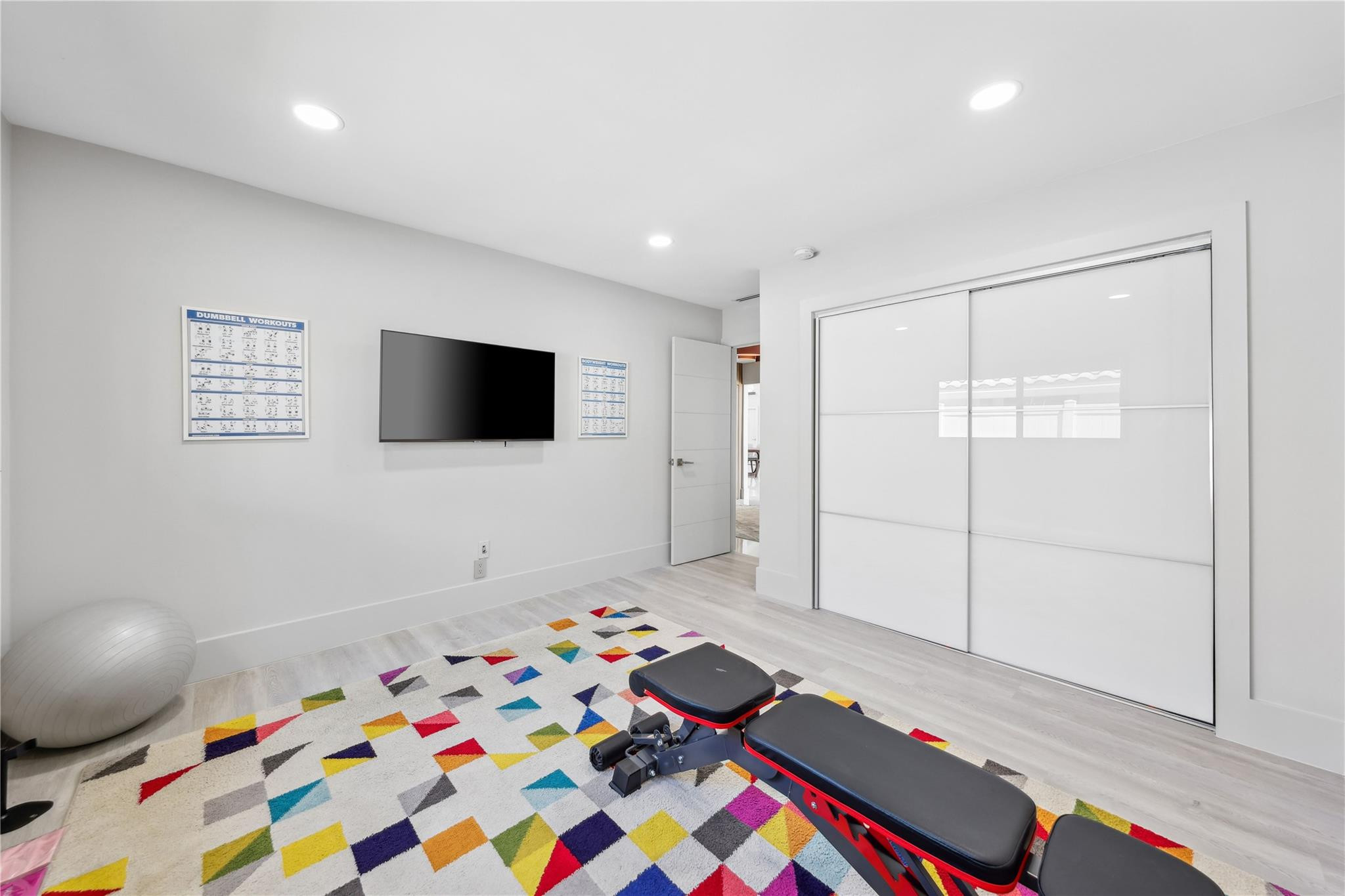 2901 Northeast 46th Street Lighthouse Point, FL 33064 - Photo 44 of 79 a room with window and flat screen tv