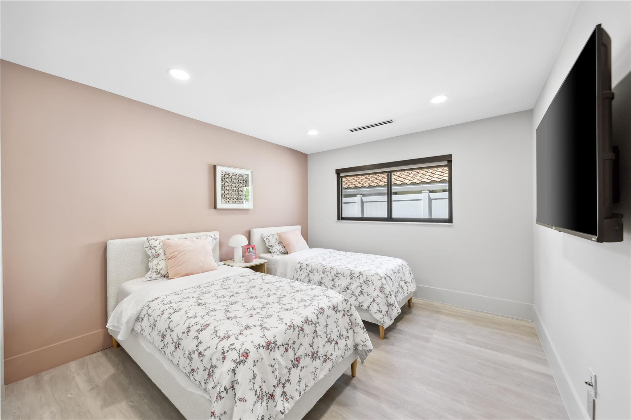 2901 Northeast 46th Street Lighthouse Point, FL 33064 - Photo 45 of 79 a bedroom with a large bed and a flat screen tv