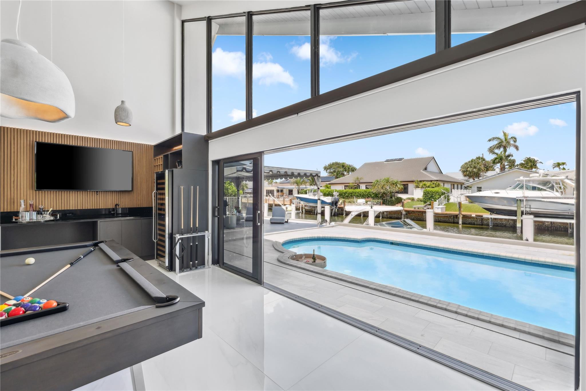 2901 Northeast 46th Street Lighthouse Point, FL 33064 - Photo 52 of 79 a living room with furniture and a flat screen tv