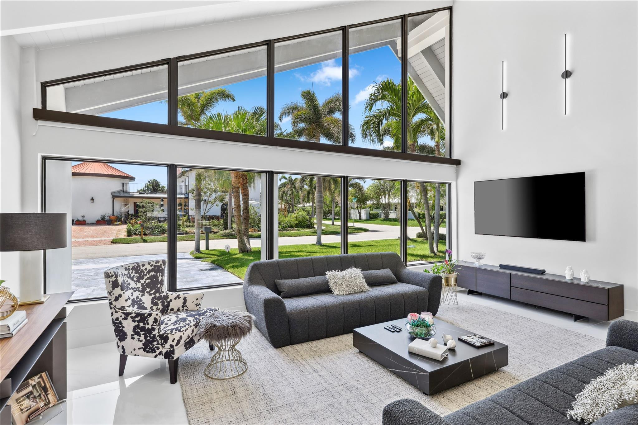 2901 Northeast 46th Street Lighthouse Point, FL 33064 - Photo 6 of 79 a living room with furniture and a large window