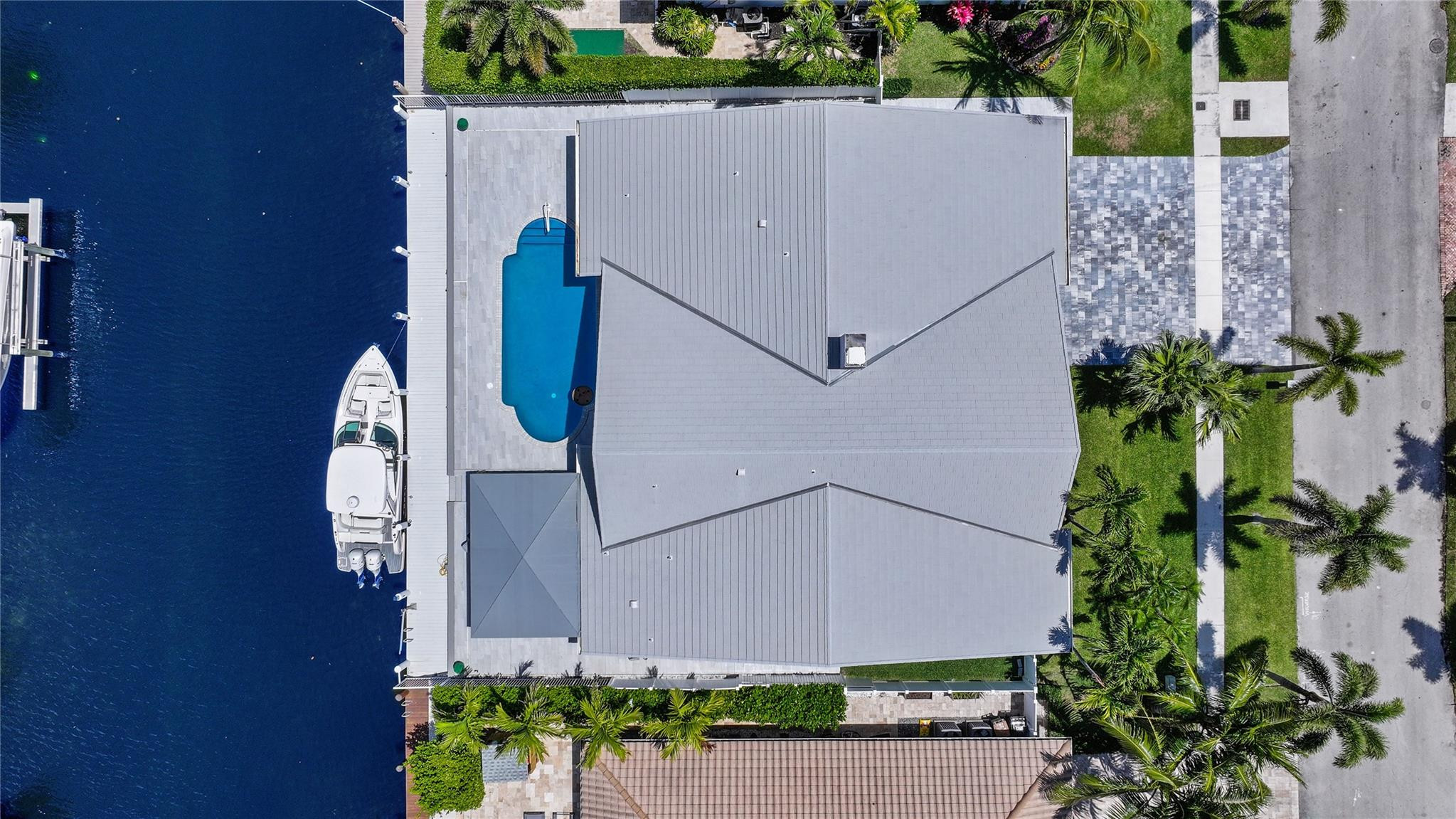 2901 Northeast 46th Street Lighthouse Point, FL 33064 - Photo 64 of 79 an aerial view of a house with garden space and plants