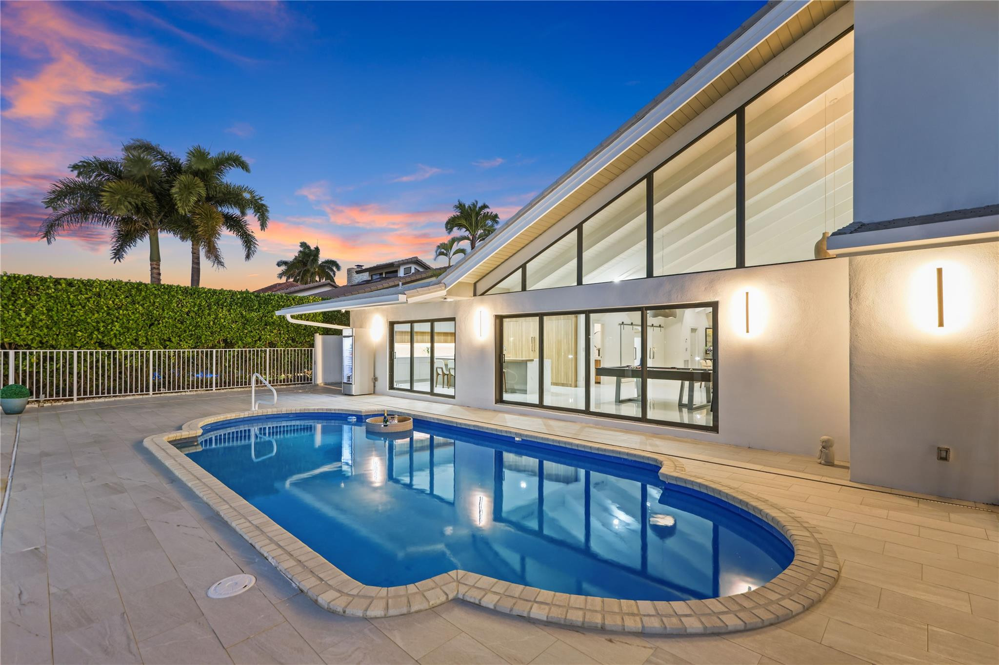 2901 Northeast 46th Street Lighthouse Point, FL 33064 - Photo 77 of 79 a view of swimming pool with seating space