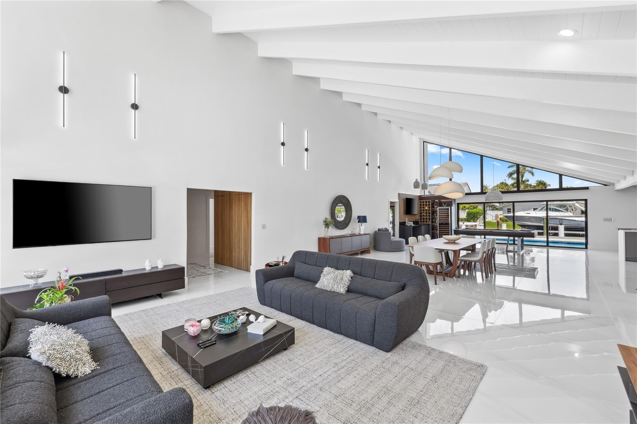 2901 Northeast 46th Street Lighthouse Point, FL 33064 - Photo 9 of 79 a living room with furniture and a flat screen tv