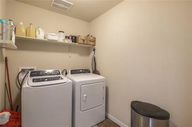 a utility room with dryer and washer