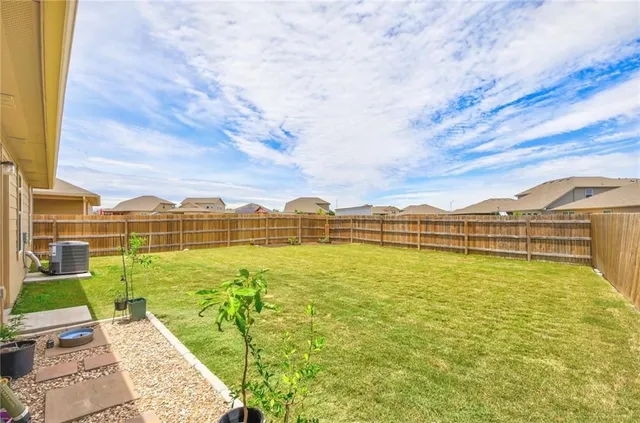 a view of an ocean with a city view