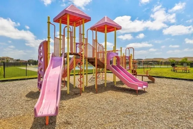 a view of a park with slide