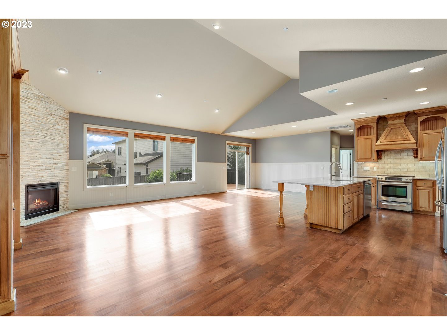 6136 Northwest Larkspur Street Camas, WA 98607 - Photo 14 of 40 a view of kitchen with furniture and wooden floor