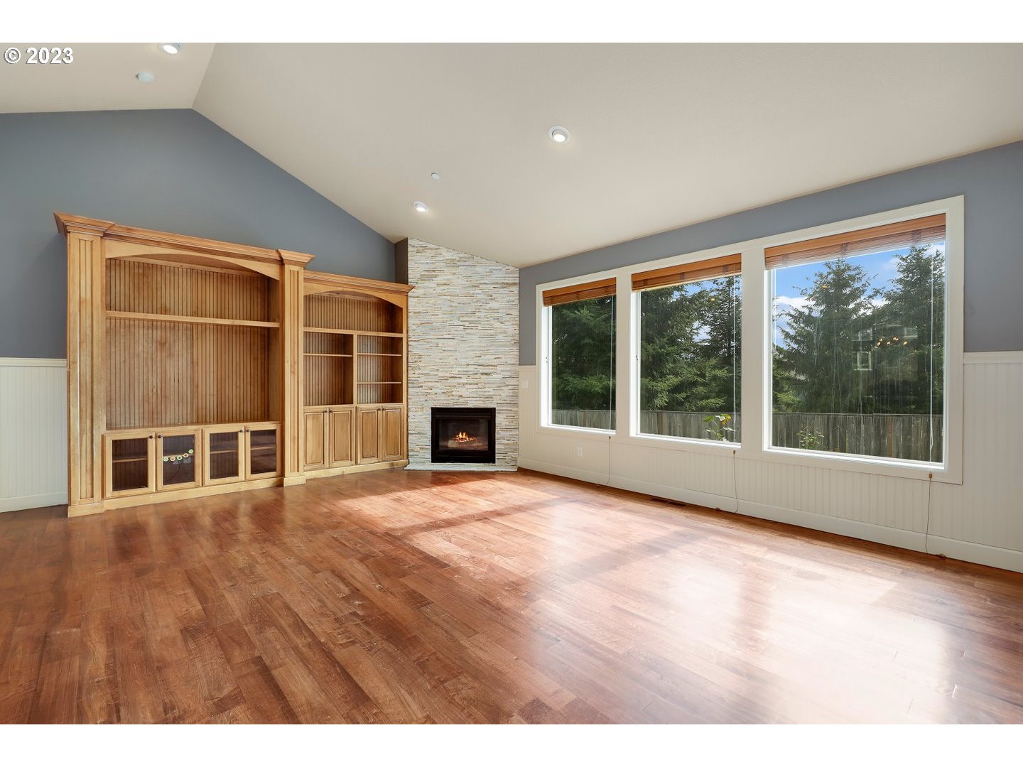 6136 Northwest Larkspur Street Camas, WA 98607 - Photo 15 of 40 a view of an empty room with wooden floor and a window