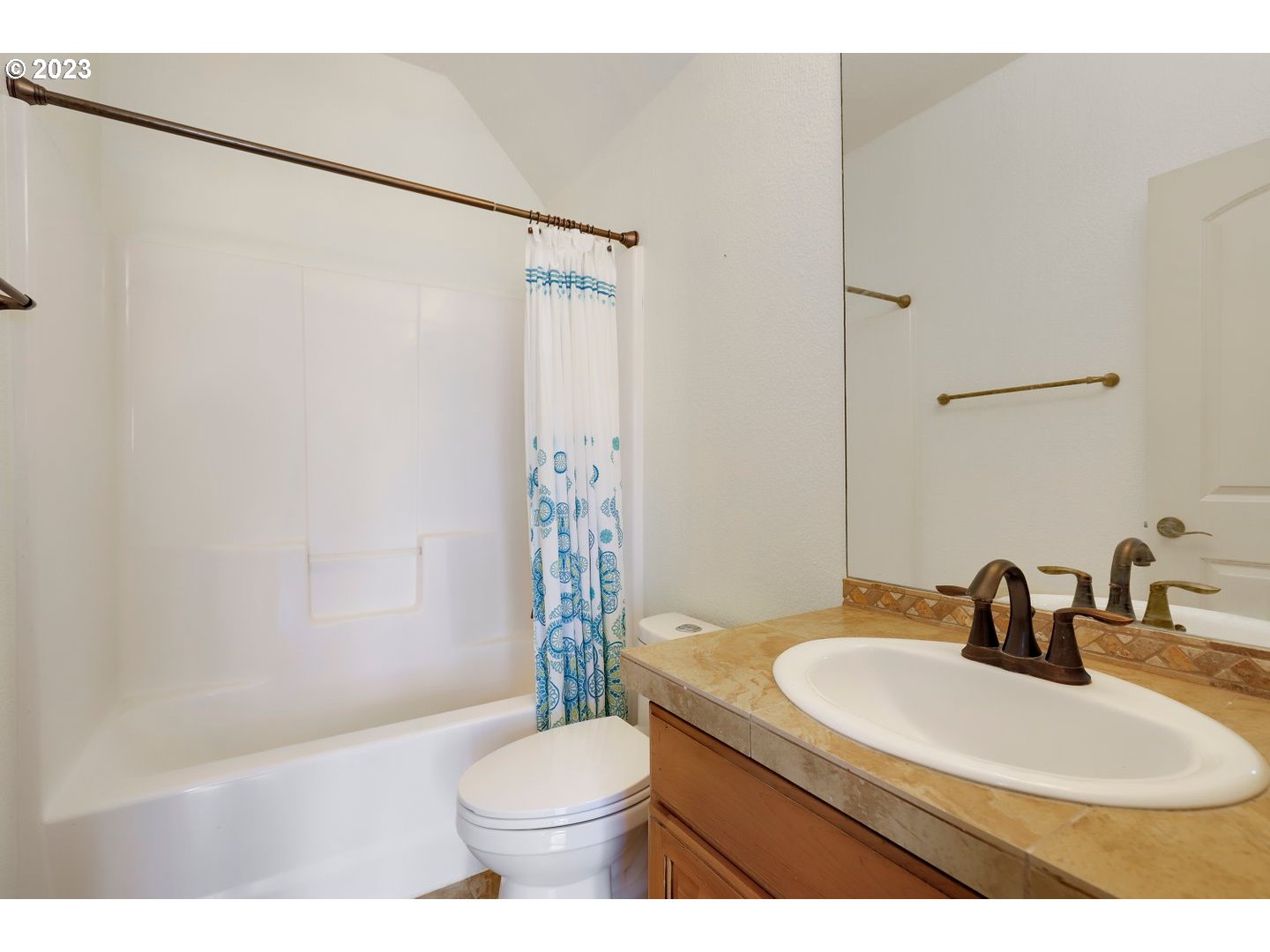 6136 Northwest Larkspur Street Camas, WA 98607 - Photo 18 of 40 a bathroom with a sink toilet and shower