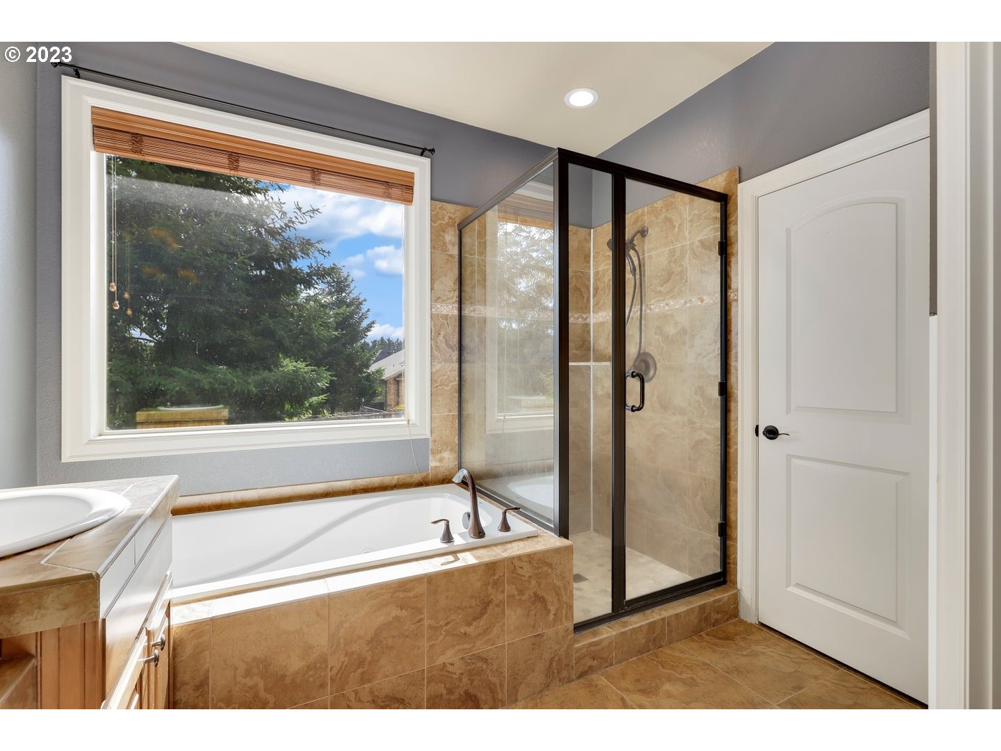 6136 Northwest Larkspur Street Camas, WA 98607 - Photo 24 of 40 a bathroom with a bathtub and a shower