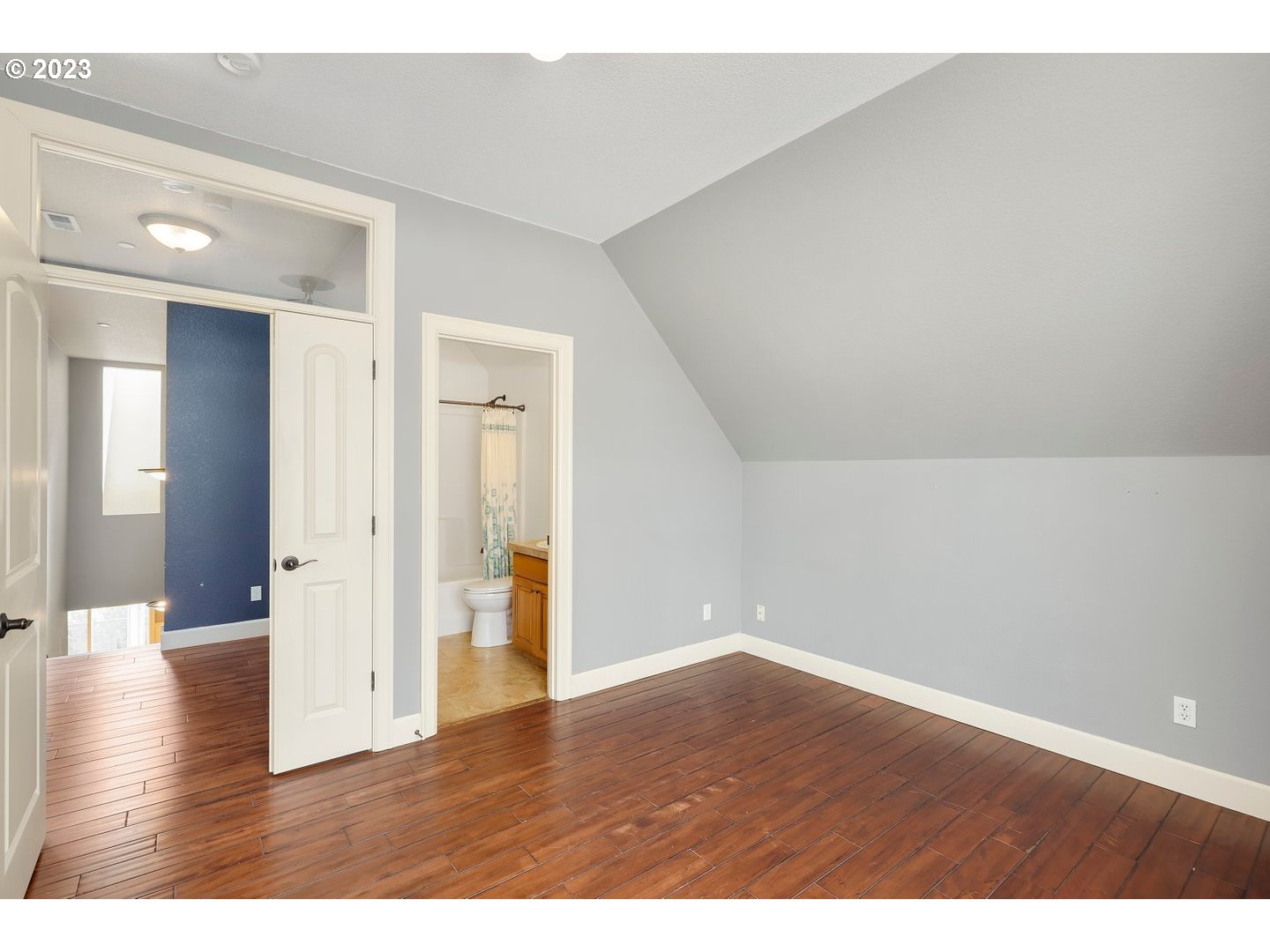 6136 Northwest Larkspur Street Camas, WA 98607 - Photo 26 of 40 a view of an empty room with wooden floor