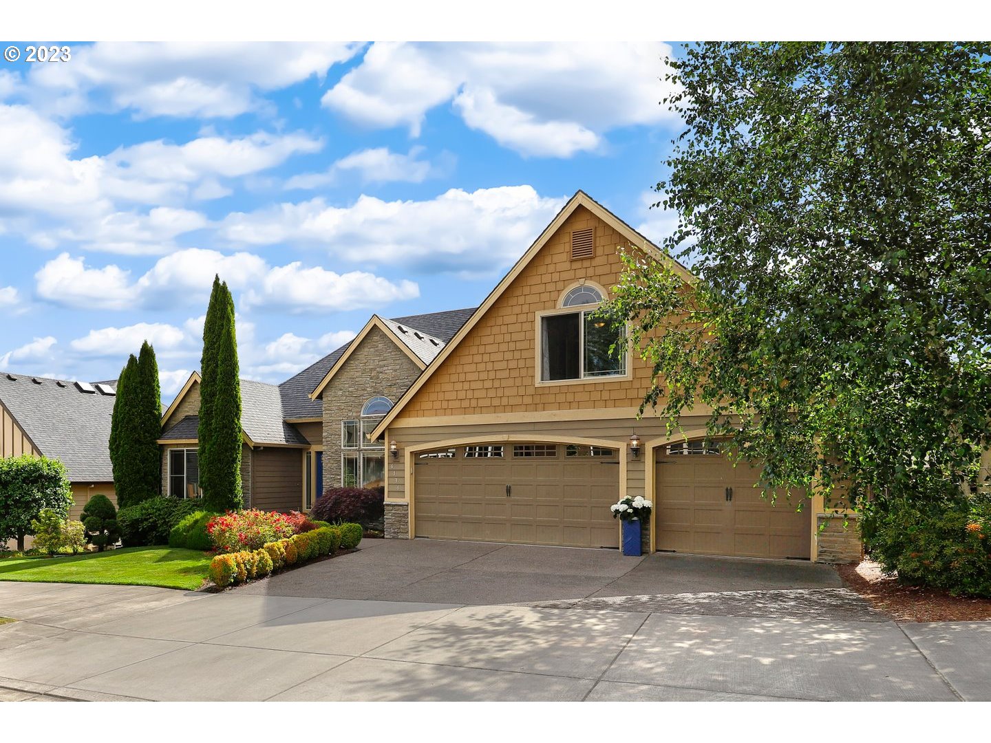 6136 Northwest Larkspur Street Camas, WA 98607 - Photo 3 of 40 a view of a small house in the back yard