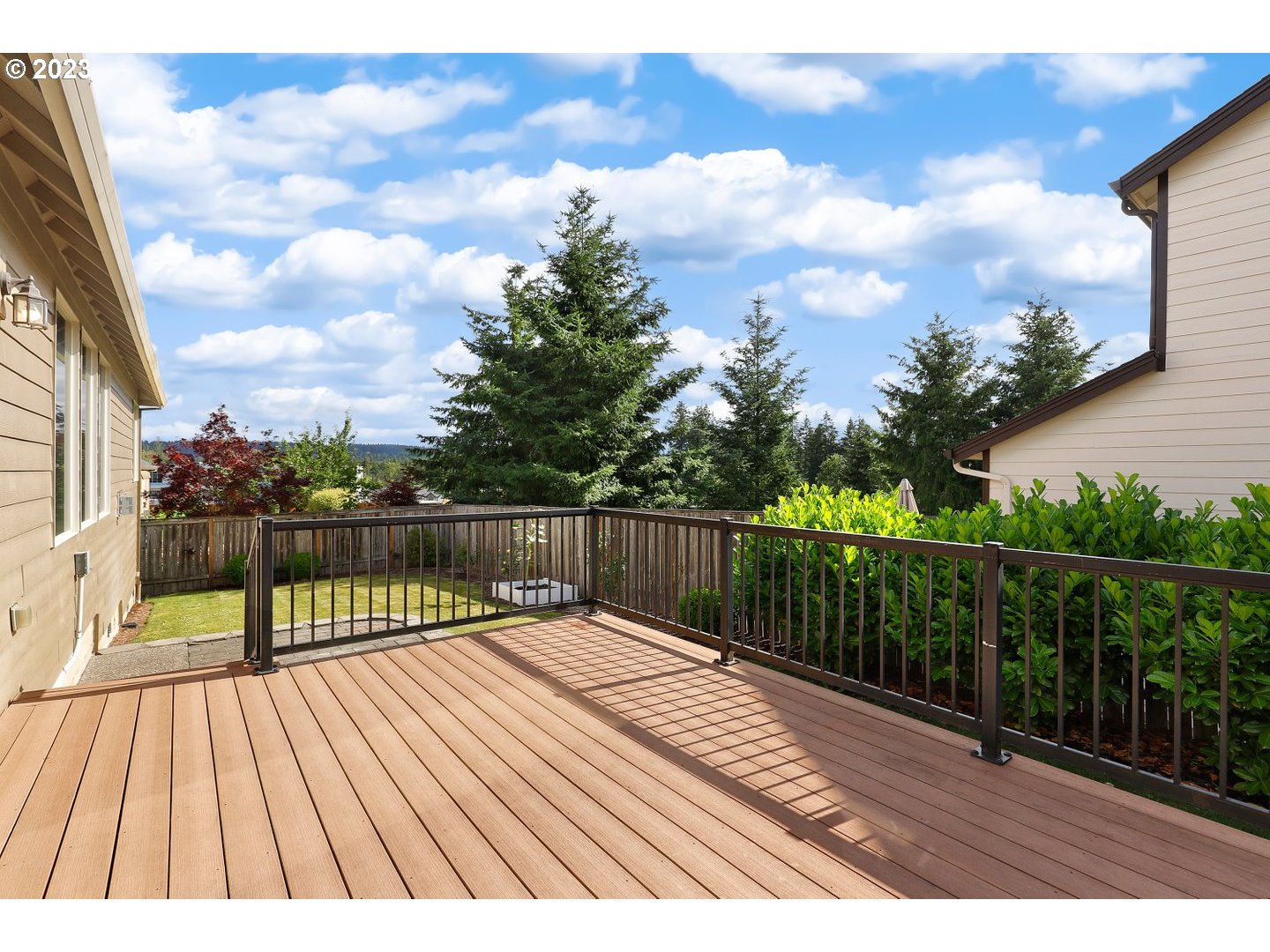 6136 Northwest Larkspur Street Camas, WA 98607 - Photo 33 of 40 a view of balcony with wooden floor and fence