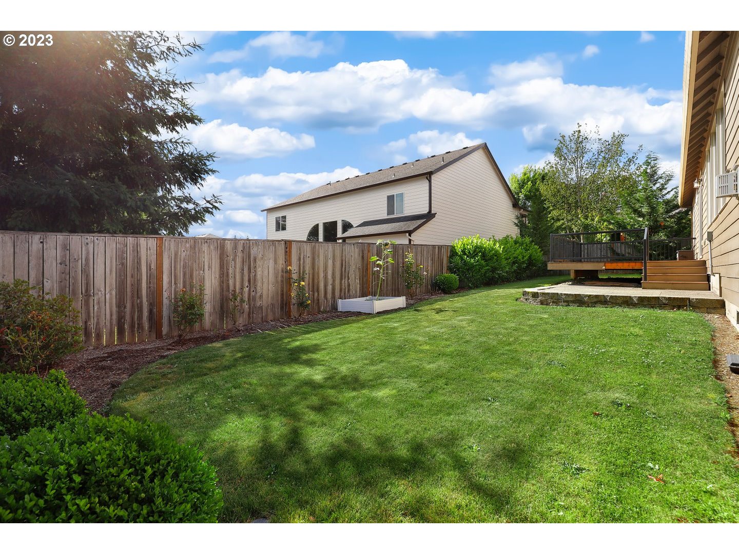 6136 Northwest Larkspur Street Camas, WA 98607 - Photo 37 of 40 a backyard of a house with lots of green space
